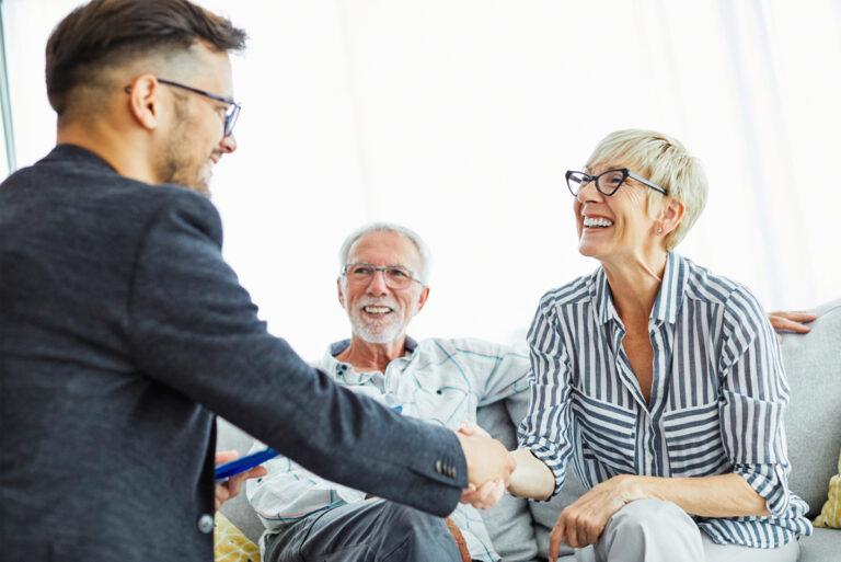 Sarasota financial advisor talking with clients