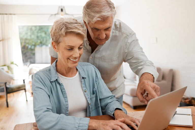 Couple making the Social Security decision to claim early or delay.